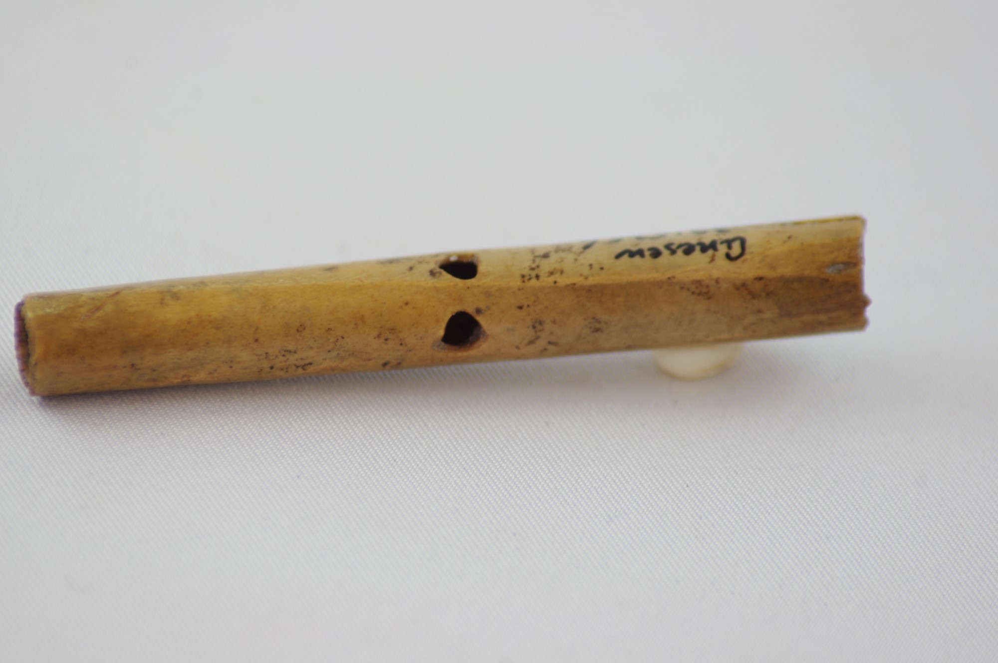 Bone Pipes with Parallel Tone Holes. Materials from Medieval Poland
